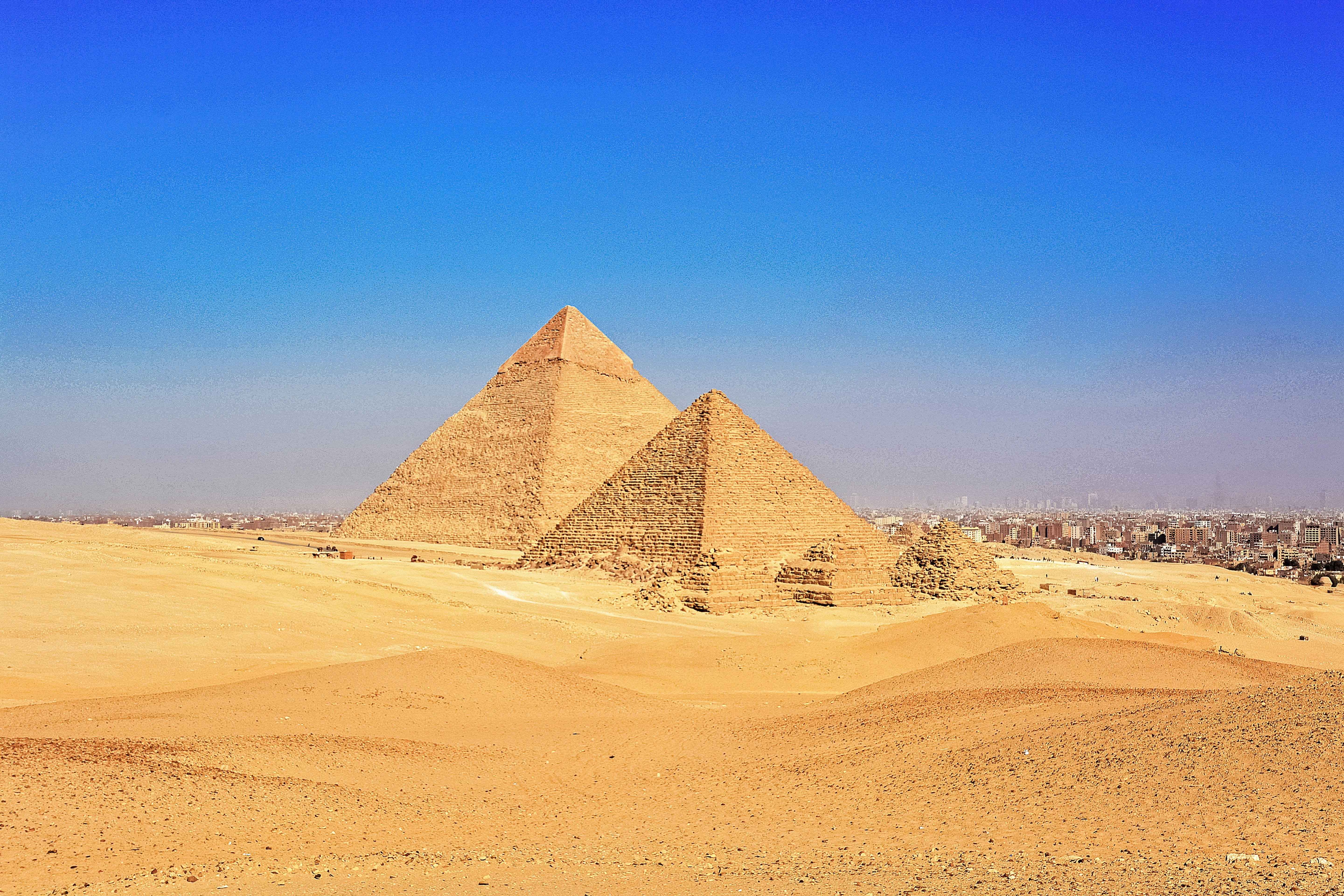 brown pyramid under blue sky during daytime